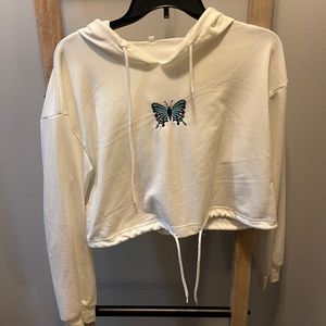 Worn once. SIZE: Medium. Butterfly Cropped Hoodie.